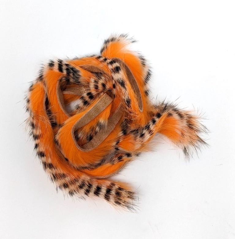 Hareline Tiger Barred Rabbit Strips Black Barred White Tipped Hot Orange
