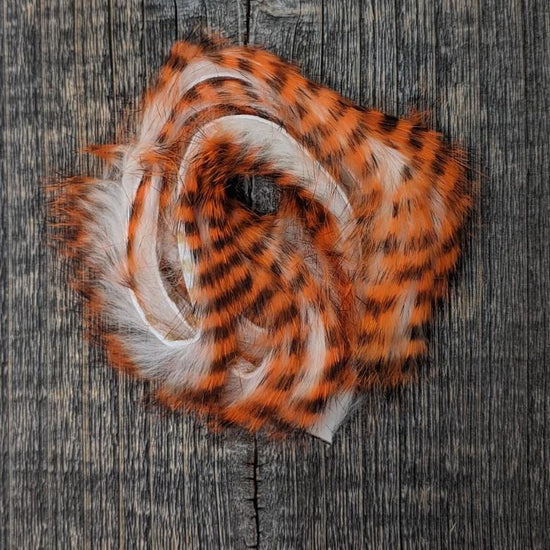 Hareline Tiger Barred Rabbit Strips Hot Orange Black over White